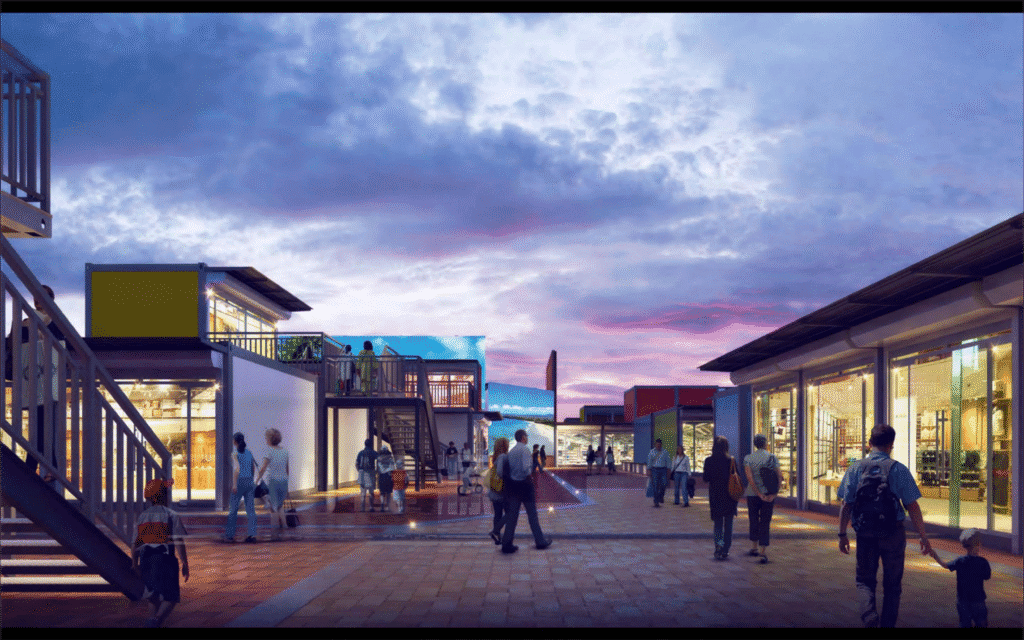 Modern modular prefab buildings showcasing sustainable and innovative design at an outdoor shopping or community space during dusk.