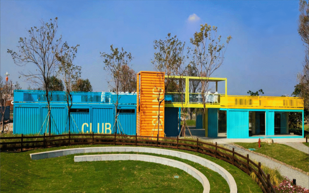 Bright blue and yellow modular container homes with modern design, eco-friendly construction, perfect for sustainable living, featuring customizable spaces and quick installation from modularhouseprefab.com.