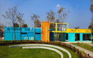 Bright blue and yellow modular container homes with modern design, eco-friendly construction, perfect for sustainable living, featuring customizable spaces and quick installation from modularhouseprefab.com.