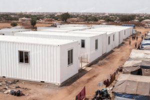 Modular humanitarian camp buildings providing accommodation for displaced communities in Africa