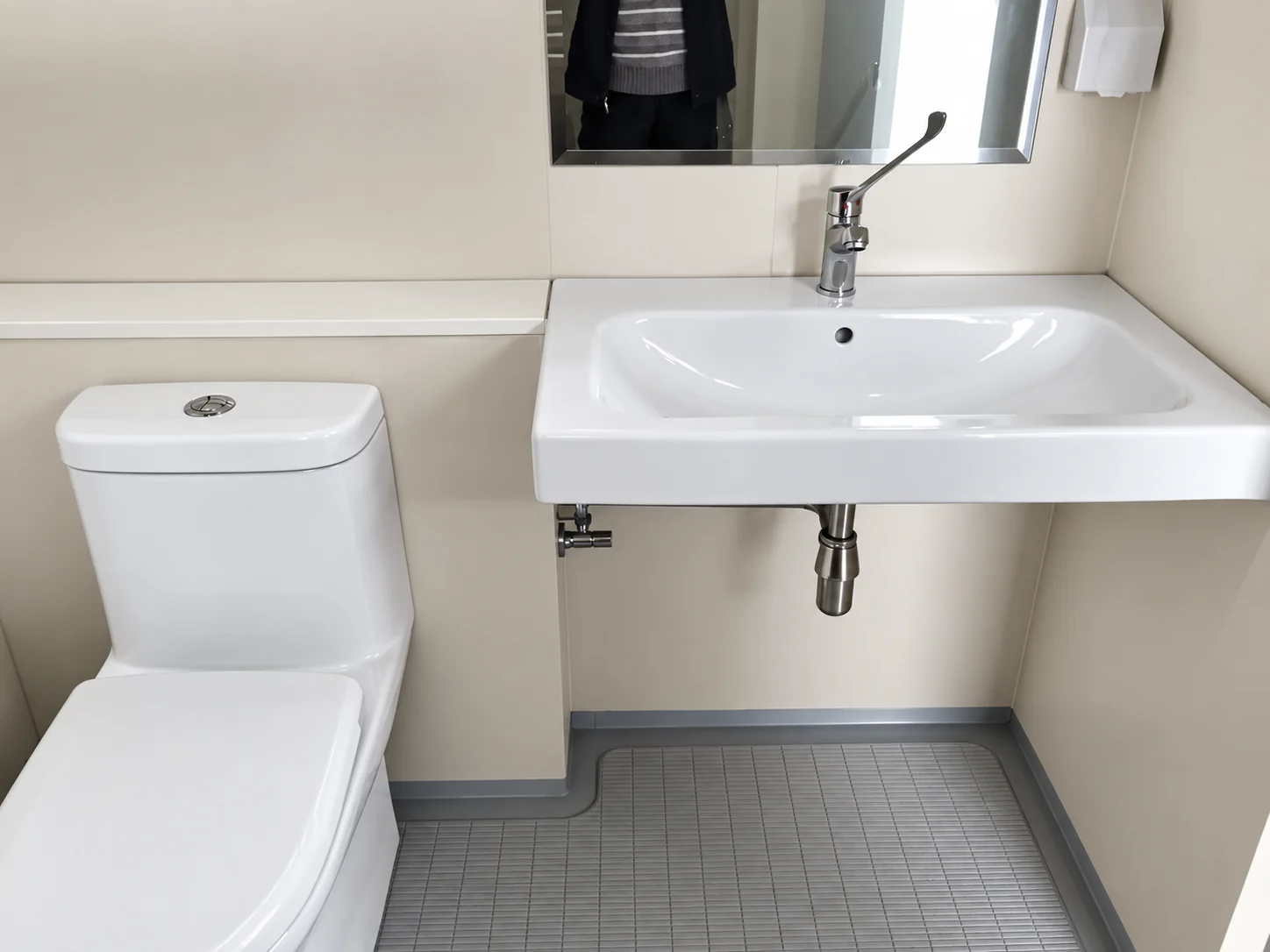 Dedicated modular restroom interior serving the 73-unit office and accommodation project