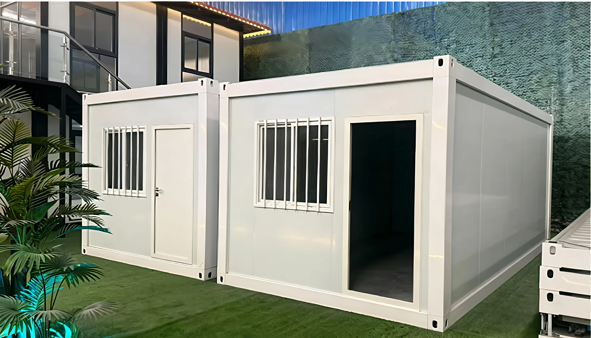 Detachable container house product display with steel frames, white wall panels and security windows