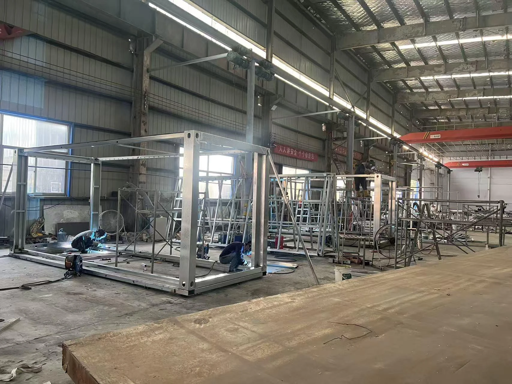 Expandable house steel frames under assembly in the production workshop
