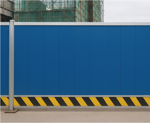 Blue panel hoarding reference with a black-and-yellow lower strip.